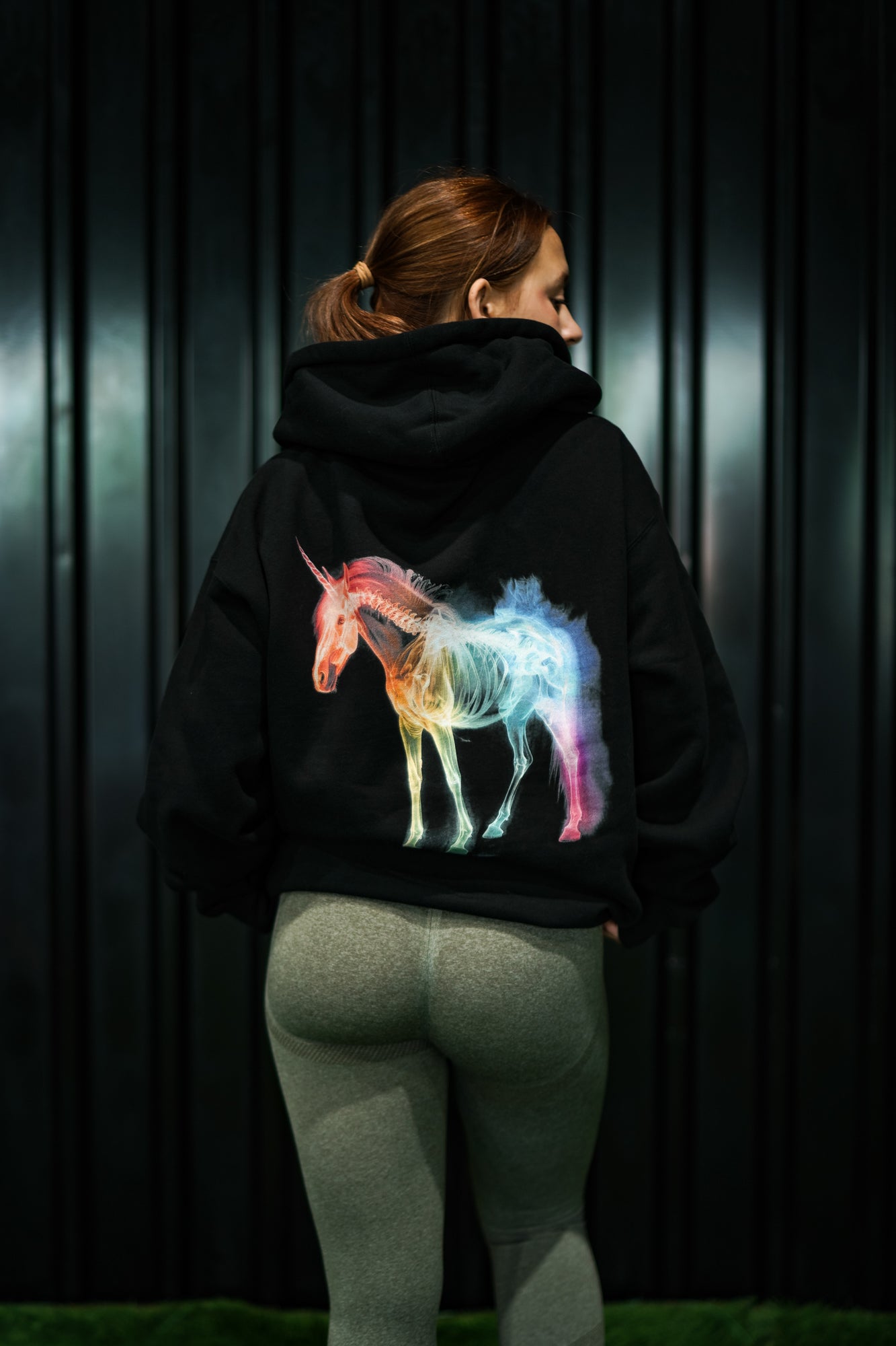 Enferno X-Ray Unicorn Hoodie in Black on model Madelyn.